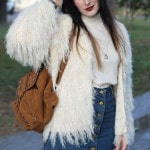 outfit seventies pellicciotto bianco stivaletti frange pittarello